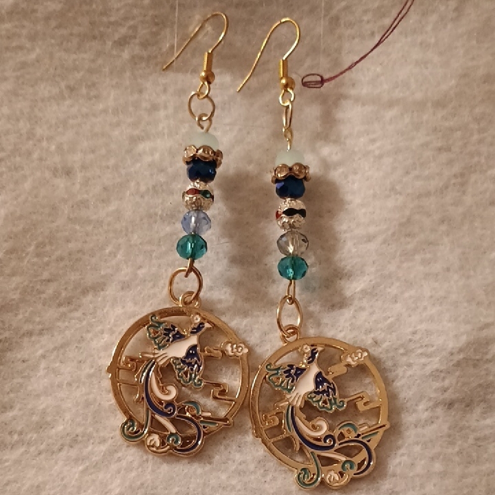 Elegant Gold and Blue Earrings with Intricate Design